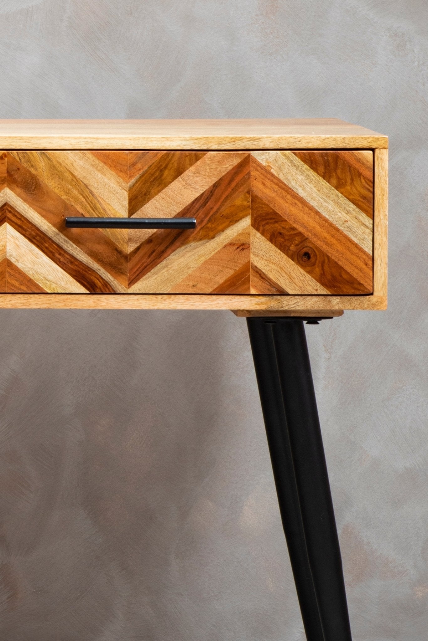 Console table styled in a modern interior setting, drawer and handle detail close up