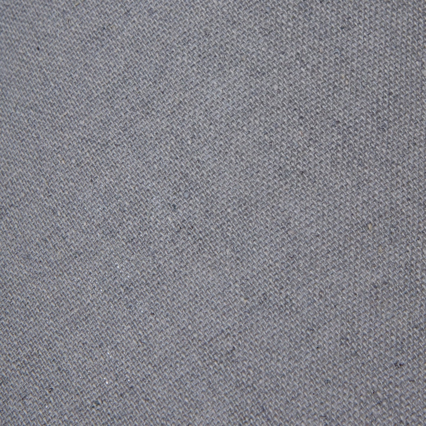 Grey fabric lampshade with tapered shape, close up