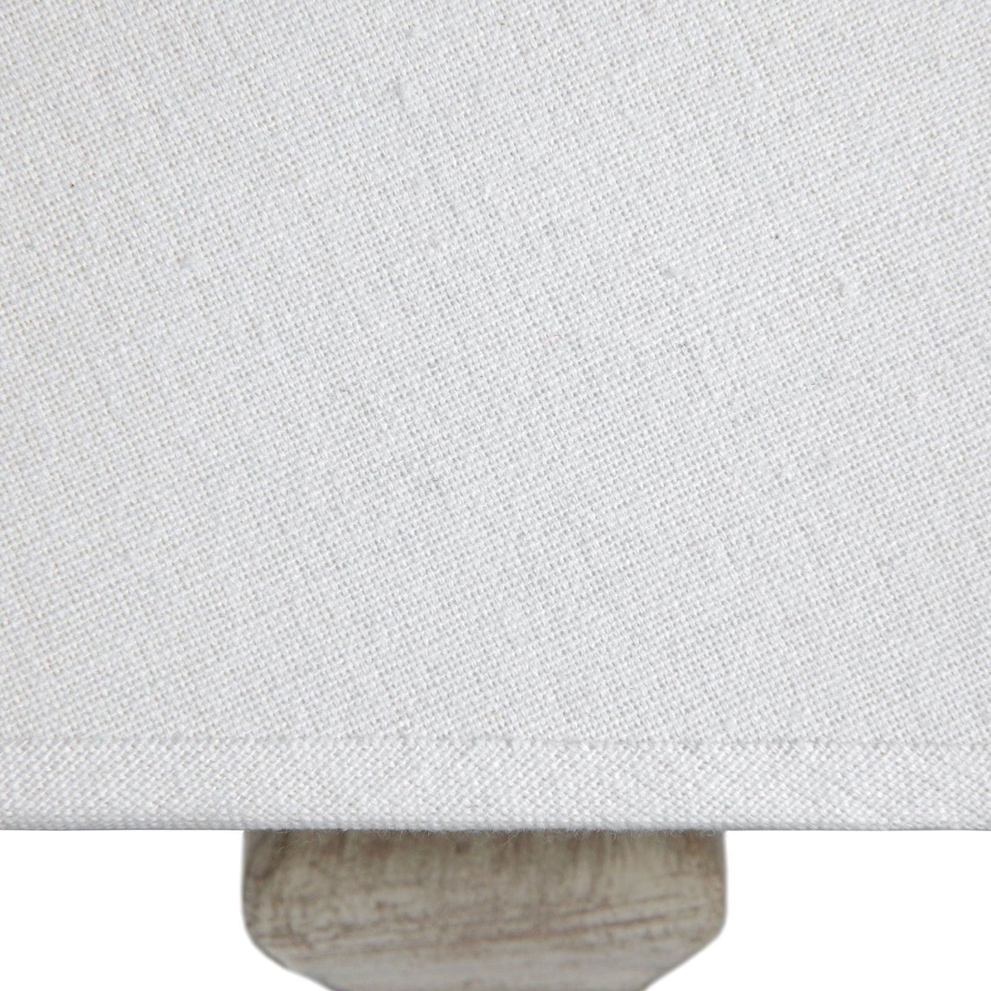 Neutral fabric lampshade with tapered shape, close up