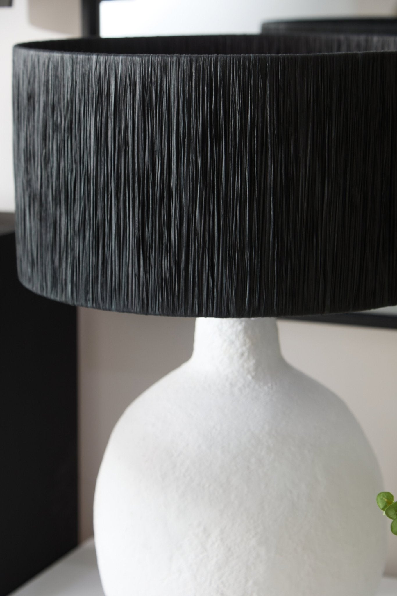 Black pleated lampshade with drum shape, close up