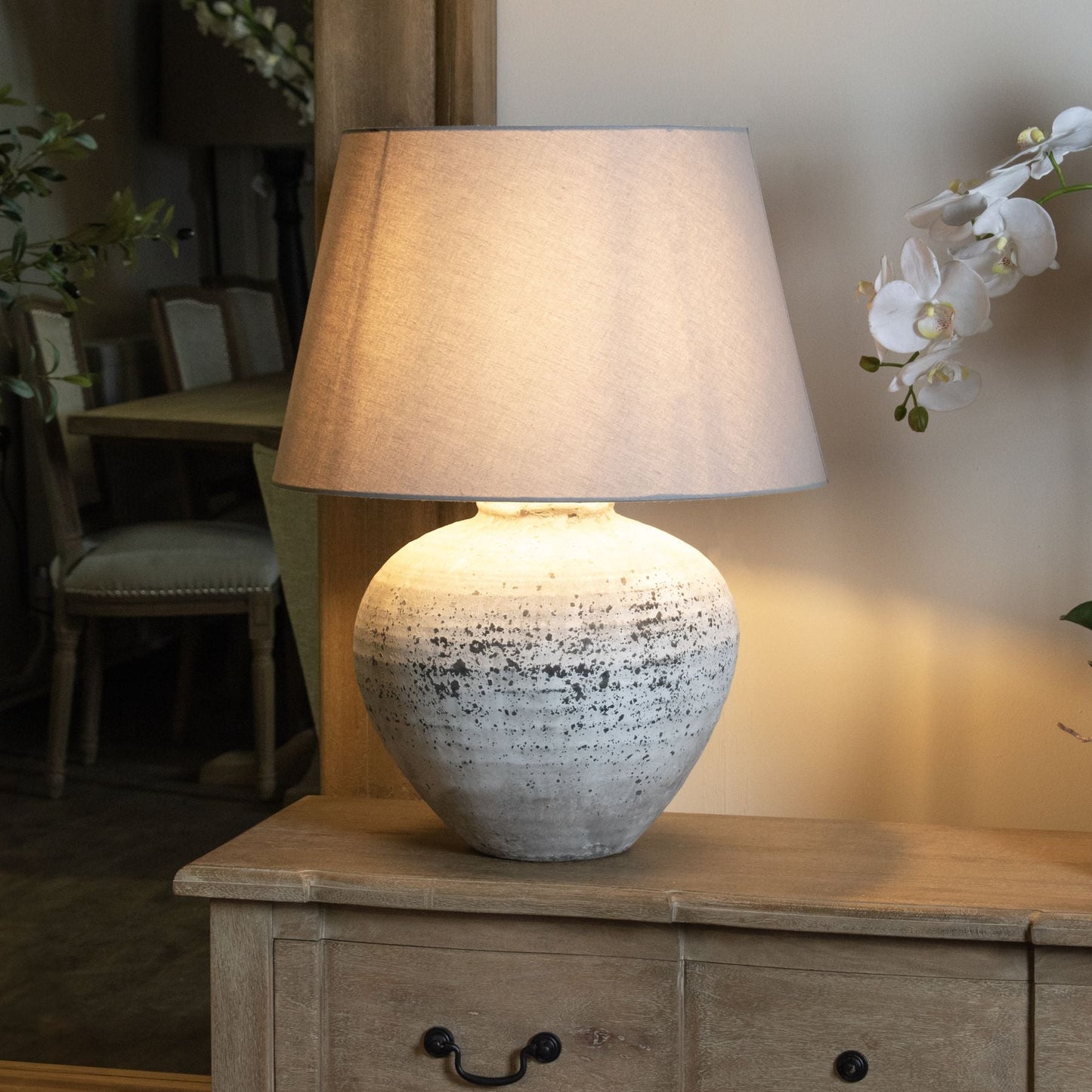 Table lamp styled in a soft, neutral interior setting
