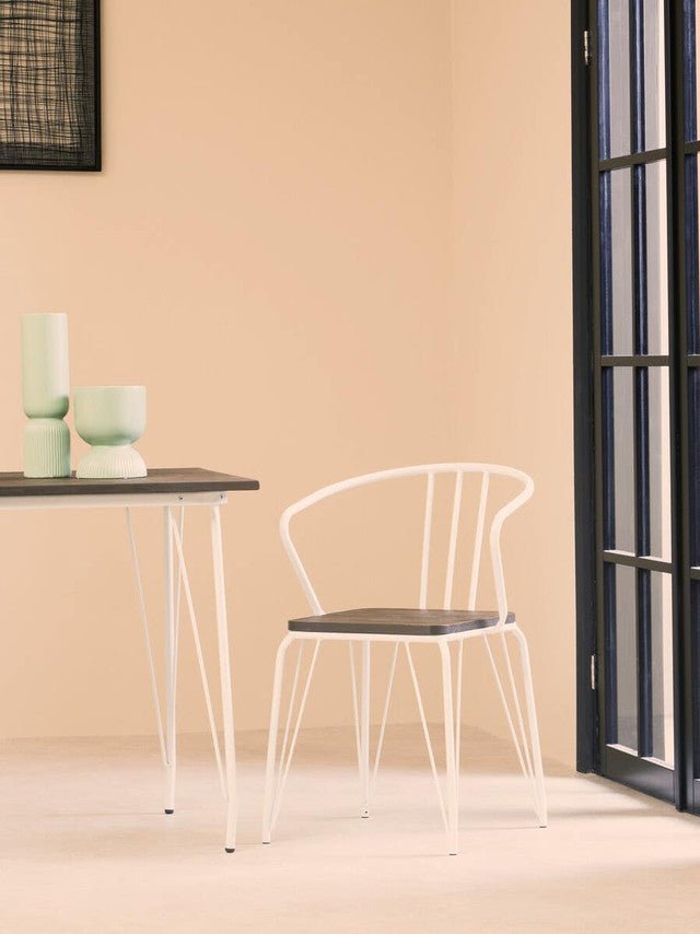 Ronan white industrial dining armchair styled with wooden dining table