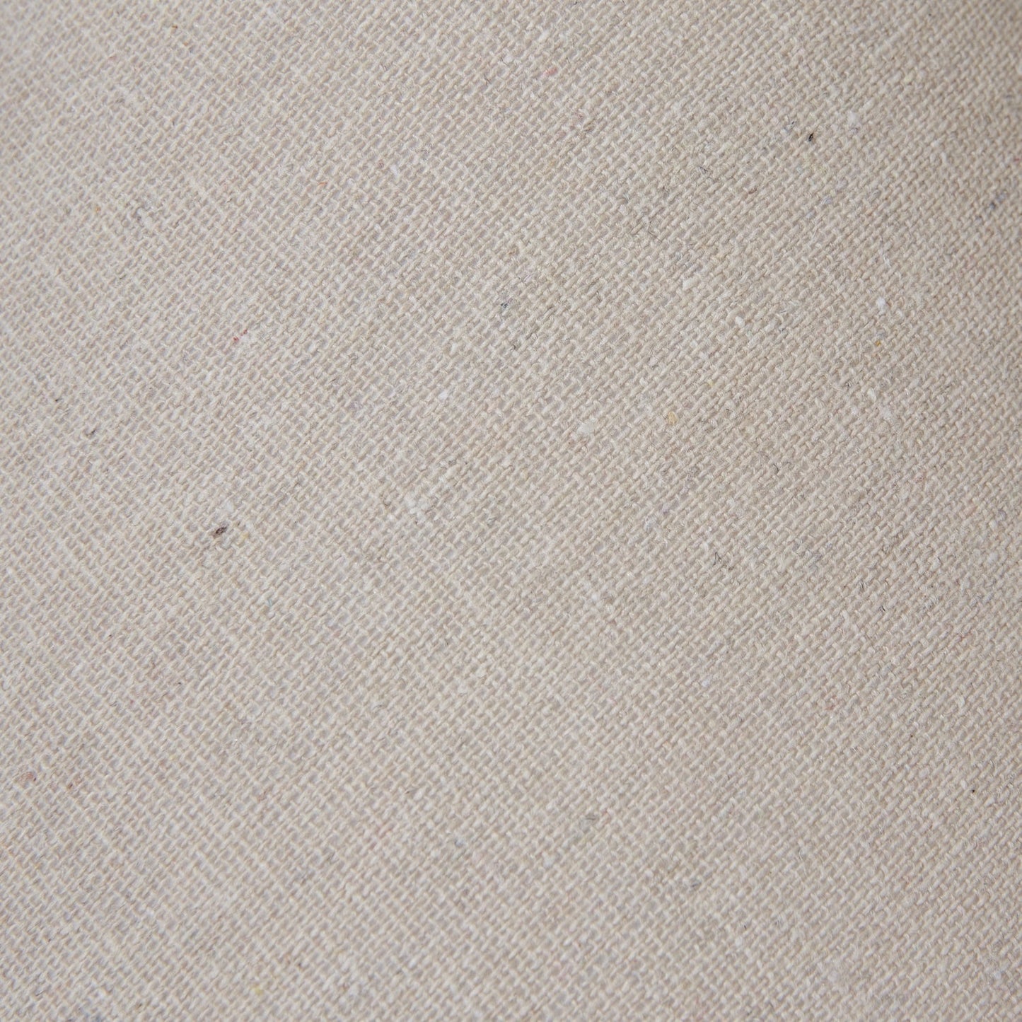 Neutral fabric lampshade with tapered shape, close up