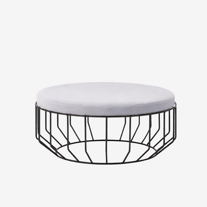 Round upholstered stool with low wire frame base