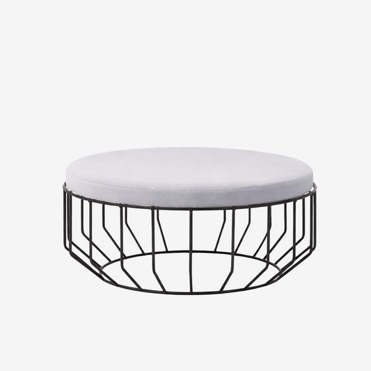 Round upholstered stool with low wire frame base