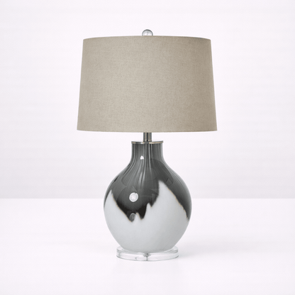 Glass table lamp with smoked ombre base and neutral fabric shade