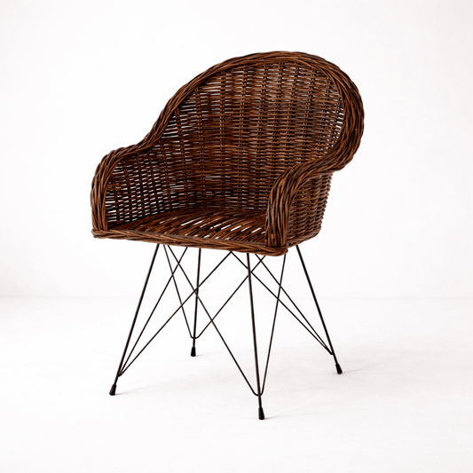 Rattan weave armchair with black metal legs and curved backrest