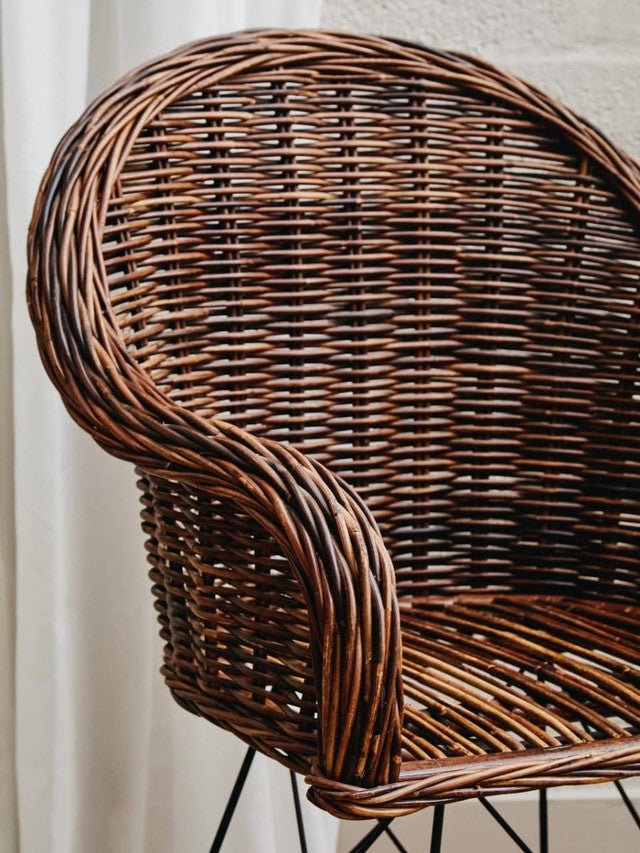 Handwoven rattan seat and back with natural texture