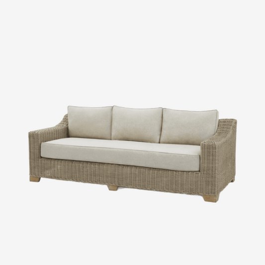 Outdoor three seater sofa with woven frame and cushions